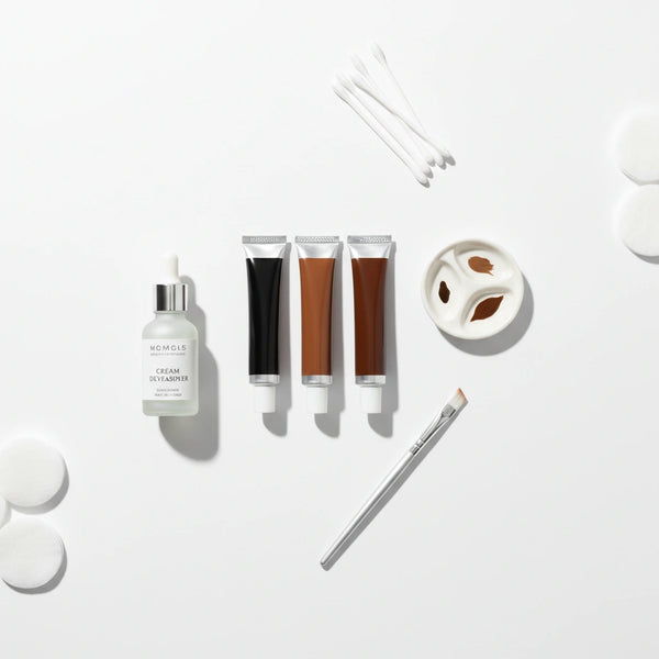 Eyebrow and Eyelash Tint Kit components flat lay — complete at-home tinting set